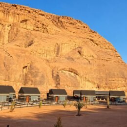 10_Cabins_Beneath_Cliff.jpg